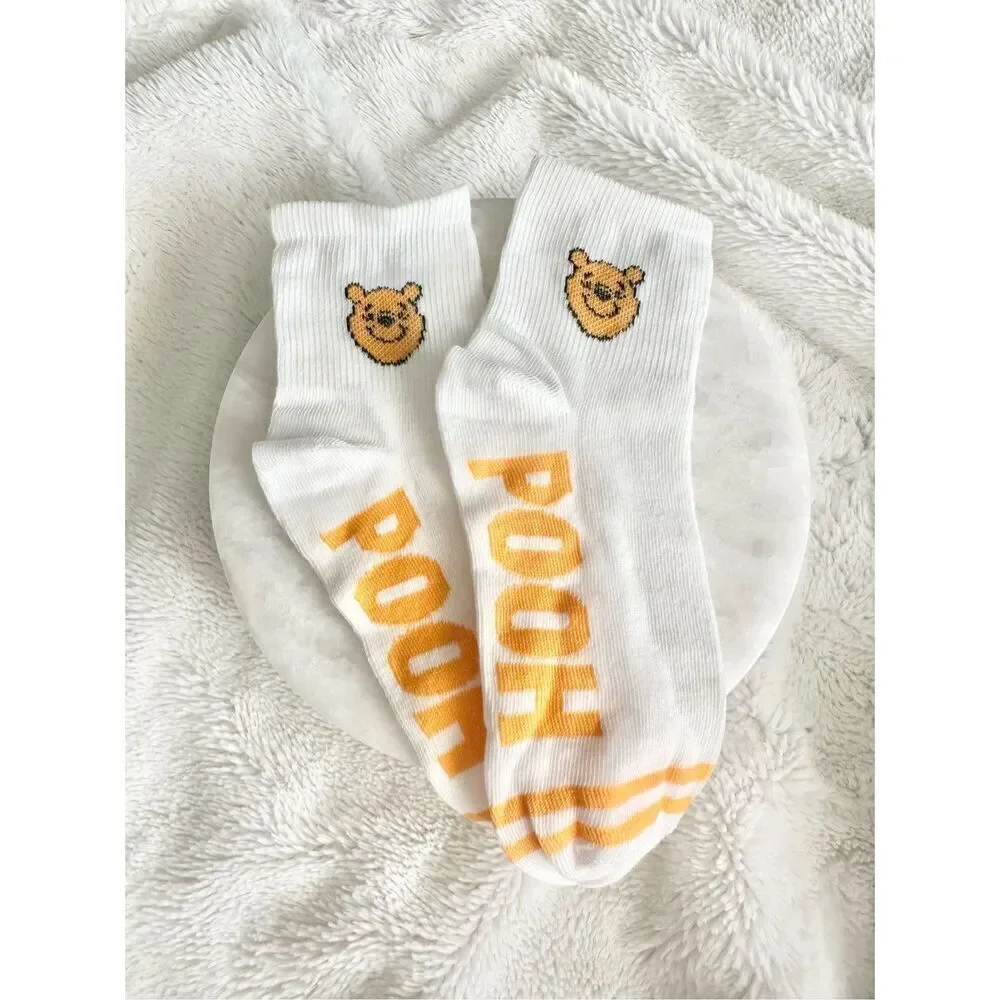Yellow and white Pooh Bear socks